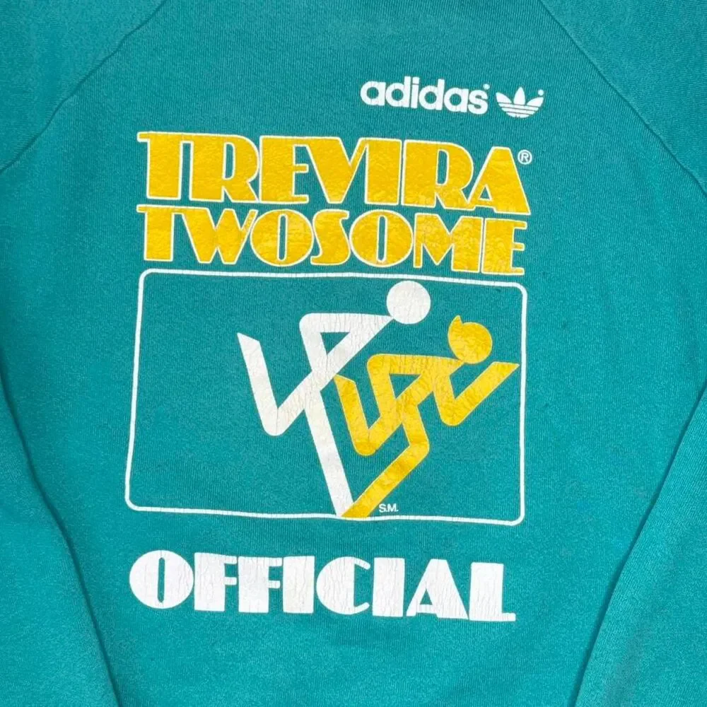 Vintage Adidas Trevira crewneck in teal‎ with bold graphic. Made in USA